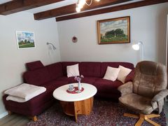 Wohnzimmer mit gemütlicher Couchrundecke
